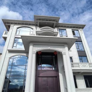 固原白麻别墅外墙干挂石材效果示例