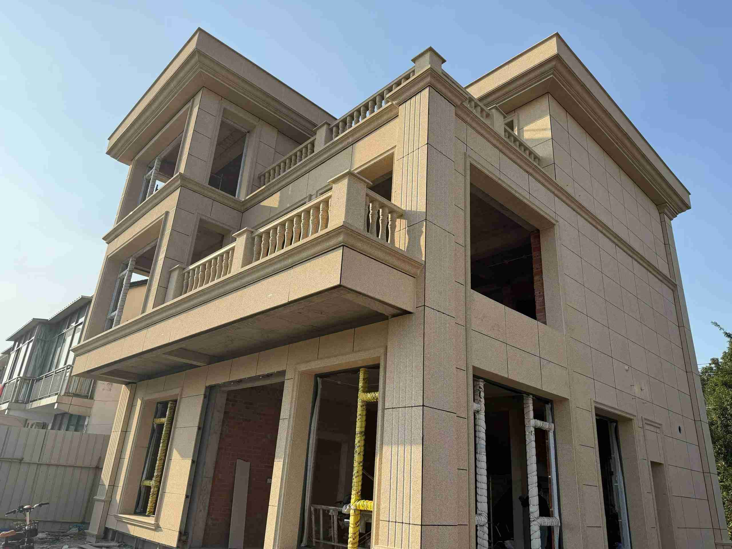 固原 黄金麻花岗岩石材荔枝面外墙干挂效果展示